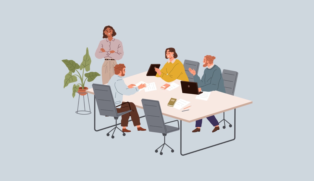 Illustration av en fyra personer runt ett bord.